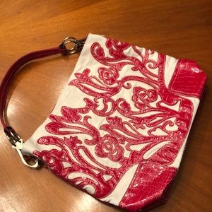 No name purse. Intricate detail on canvas. Red vegan alligator design